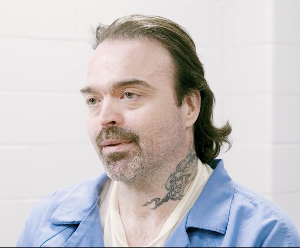 photo of Stephen, incarcerated learner wearing a light blue shirt